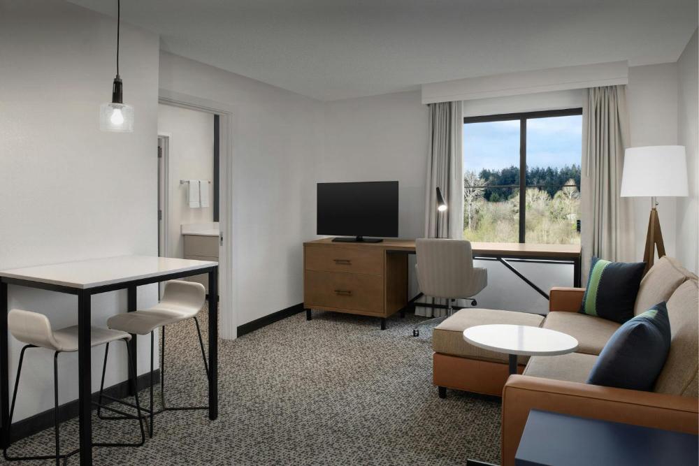 One-Bedroom King Suite with View and Sofa Bed - Mobility/Hearing Accessible with Roll-In Shower interior